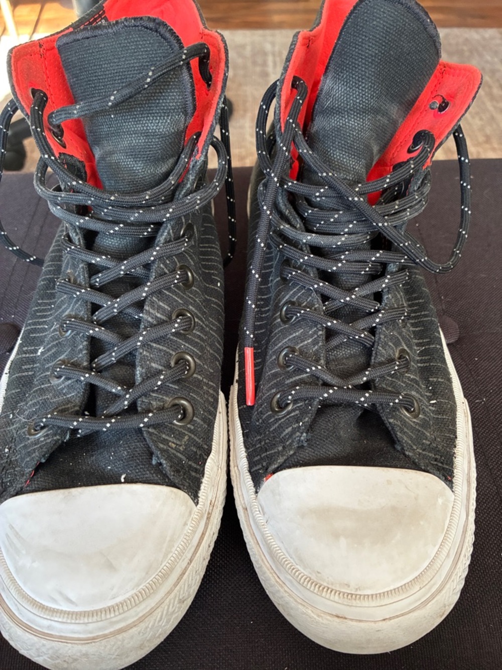 Converse Black High-Top Sneakers with Red Lining